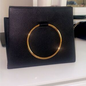 Elegant Black Handbag with Gold Accent